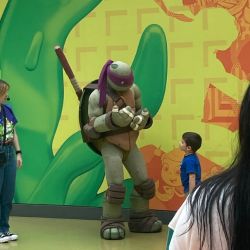 A Donatelo character mascot in the Mall of American Nickelodeon Universe